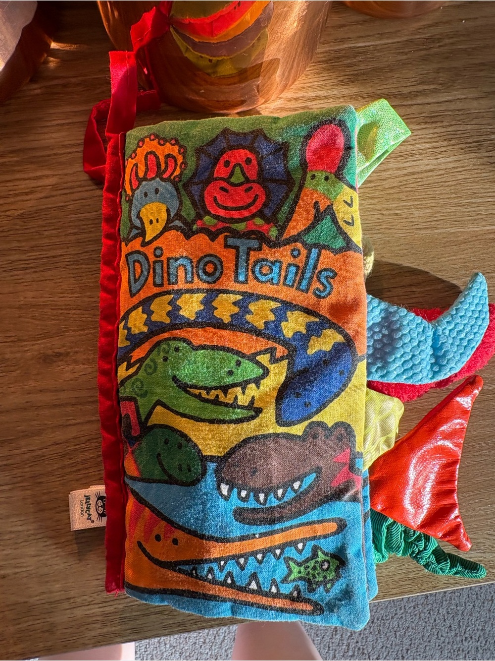Jellycat DinoTails Plush Activity Book - Red, Orange, Yellow, Green, Blue